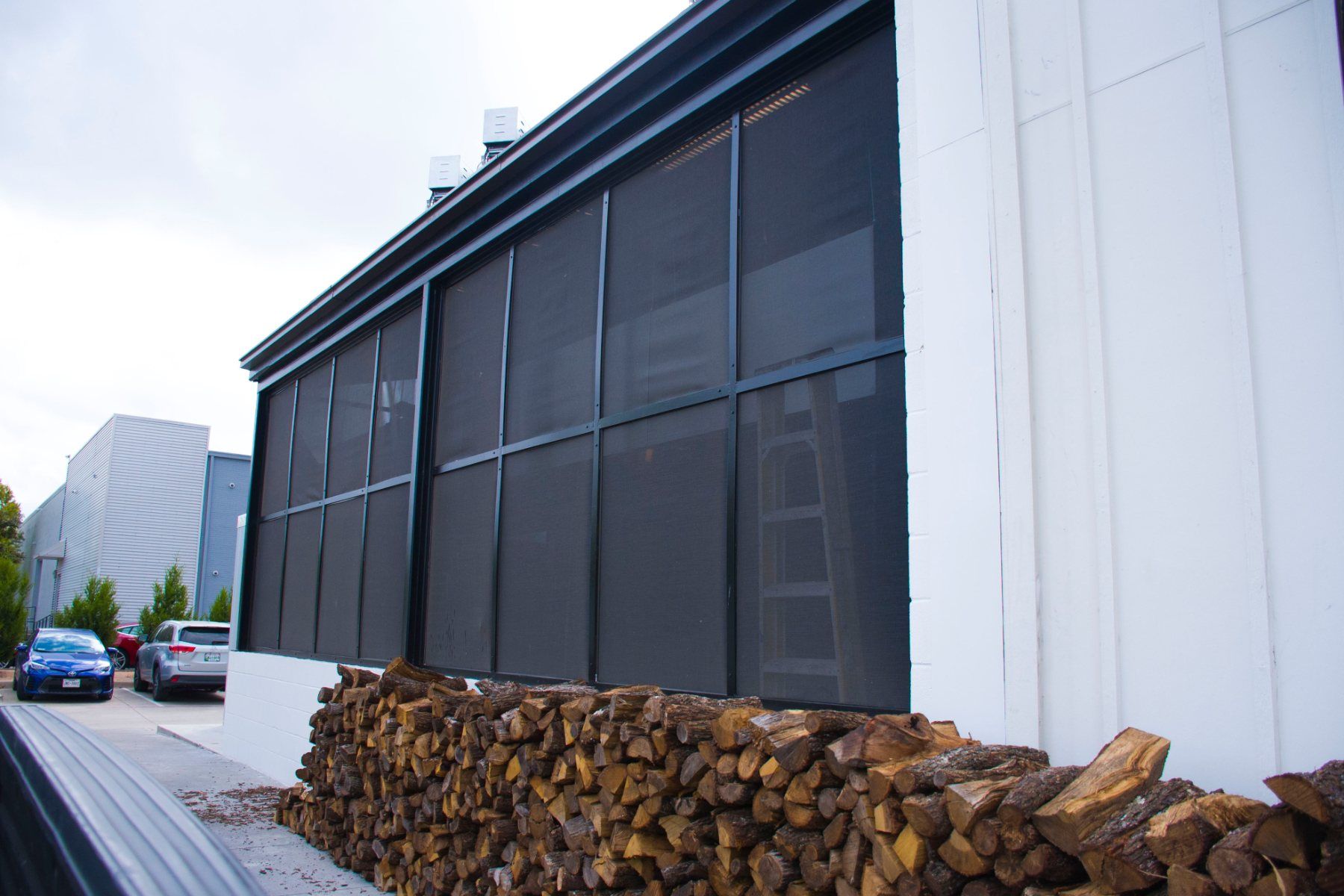 Heim Barbecue — smokehouse & woodpile