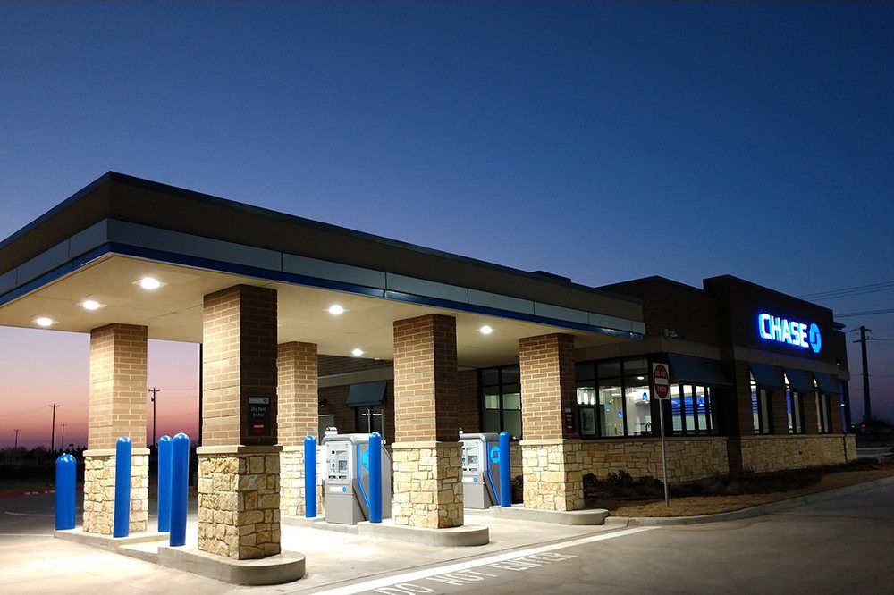 JPMorgan Chase — drive-up lanes at dusk